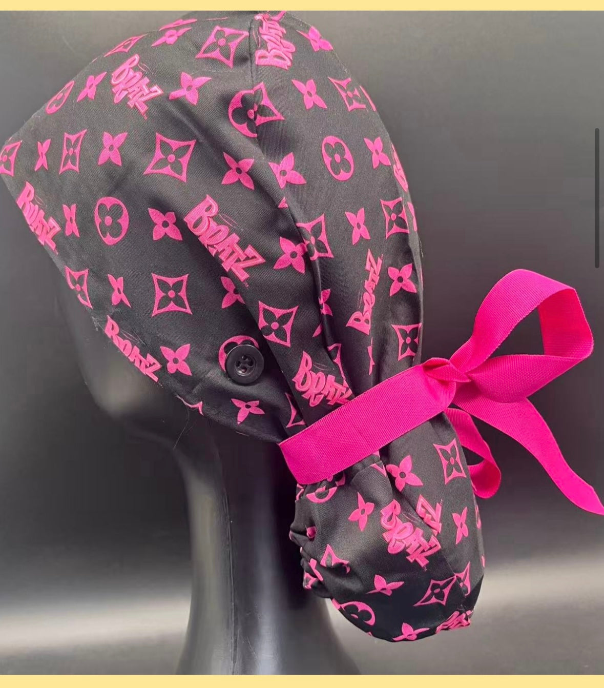 Satin lined scrub caps with a matching badge reel