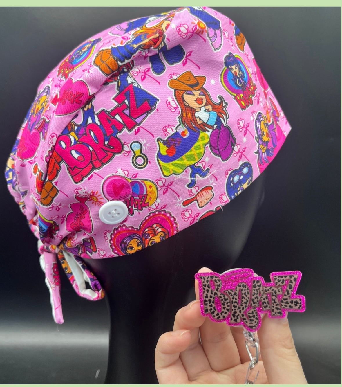 Satin lined scrub caps with a matching badge reel
